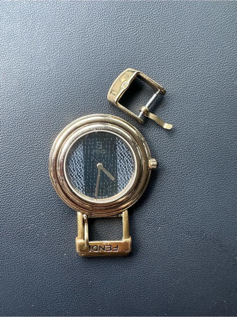 Fendi Gold Round Case with Black Pattern